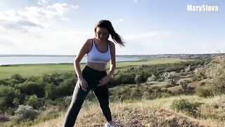 Training outdoors with a fit girl, ending in intense action