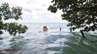 Babe has amazing sex right in the blue lagoon, showcasing sensual passion