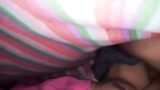 The man fucks his girlfriend with a big ass under the sheets hard