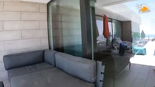 A blonde girl with socks in the pool satisfies her boyfriend