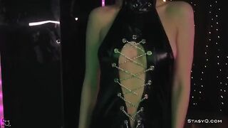 Skinny teen AngelQ strips on the stage in a sensual performance