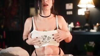 A big-breasted goth girl plays with her new toy and fucks with it