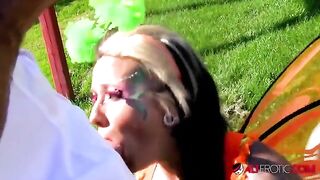 A cosplay model with tattoos fucked outdoors in a passionate scene