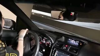 Cute girl fucks in the car in the parking lot