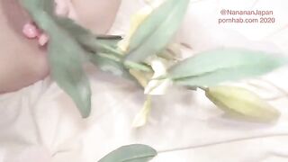Bukkake while putting flowers in the ass of a Japanese girl