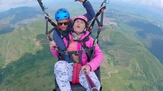 Sexx Sexxx squirts while paragliding 2200 m above the sea in a daring stunt