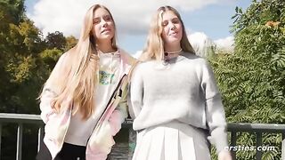 Two hot lesbians have a look at the Kama Sutra and imitate it with their bodies