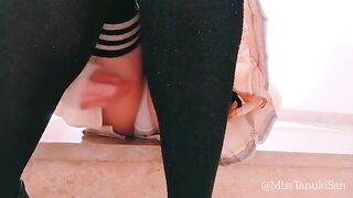 A schoolgirl without panties masturbates seductively in public space