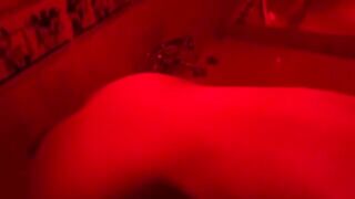 A sexual blondie is playing with sex toys in the bathroom