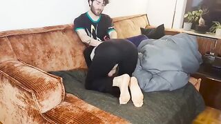 A couple have real sex right under a blanket, reaching climax