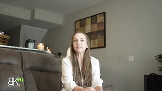 Stepmom shares a couch with her stepson in a taboo roleplay scene