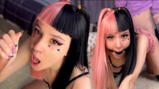 Emo babe with a hot pink haircut gets her mouth full of cock in this steamy scene