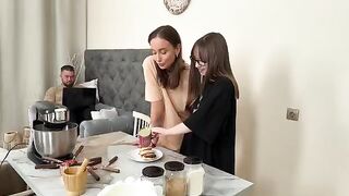 Two girls have fun while cooking Russian syrniki, getting intimate