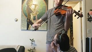 Girl trying to practice violin, but her boyfriend is jerking off instead