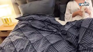 A hot stepmom shares bed with her stepson on a rainy night