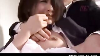 An Asian guy is painting the wall when his sister comes in wearing only panties