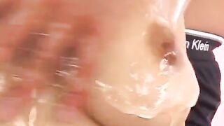 Oiled Japanese boobie massage turns into a hot handjob session