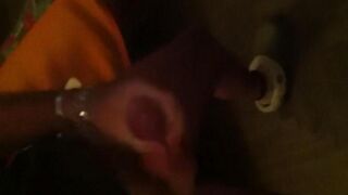 A young guy masturbates in front of the mirror with loads of cum