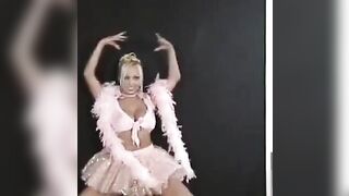 A hot Russian girl is dancing and stripping, getting everyone excited