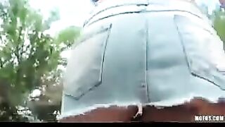 Street masturbation of a hot brunette with a camera nearby