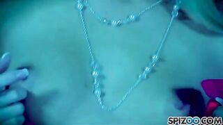 A blonde girl caresses herself with a dildo and reaches orgasm