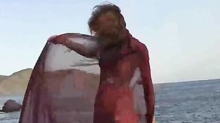 A girl with small boobs gets wet while walking naked