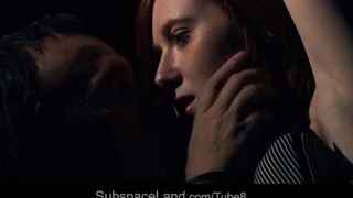 A red-haired teen is being raped in the dark room