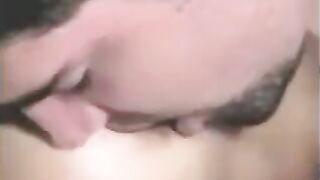 A man has sex with a girl using a strapon, and another plays with him