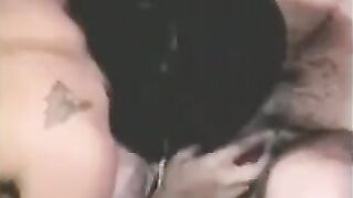 A man has sex with a girl using a strapon, and another plays with him