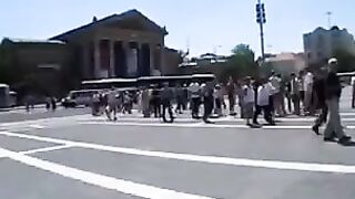 A sexy model is having fun with her boyfriend in public place