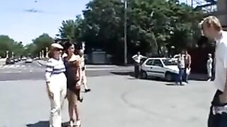 A sexy model is having fun with her boyfriend in public place