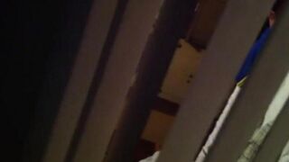 He shoots a hidden camera as his neighbors have sex, just like in the movies
