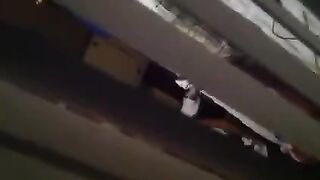He shoots a hidden camera as his neighbors have sex, just like in the movies