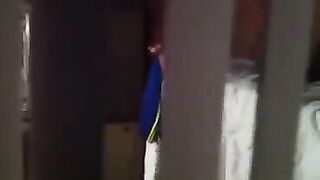 He shoots a hidden camera as his neighbors have sex, just like in the movies