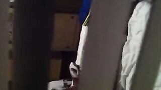 He shoots a hidden camera as his neighbors have sex, just like in the movies
