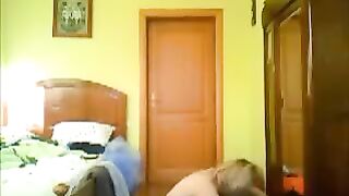A peeping guy shoots sex of a girl in her room