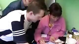 A Russian woman with her mother is fucking with four guys