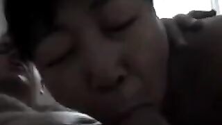 Chinese beauty practices blowjob with her man