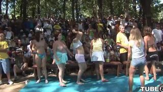 A young girl has a lot of fun with someone in the forest