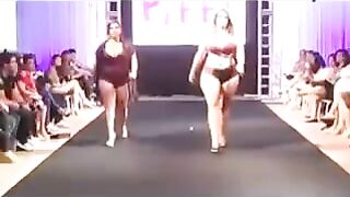 Fatty bitches in swimsuits are running in front of cameras on the boardwalk