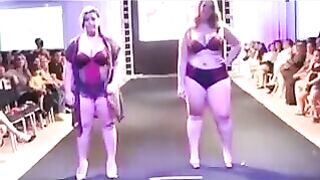 Fatty bitches in swimsuits are running in front of cameras on the boardwalk
