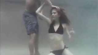 Redhead beauty making love with a guy in the swimming pool