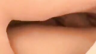 Two pretty Russian girls are having fun with their friend at home