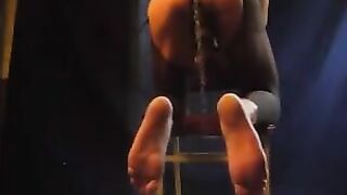 A sexy guy in pantyhose holds his dick and makes cancer