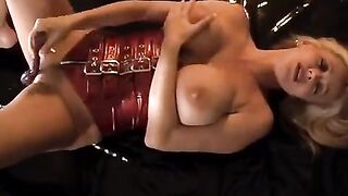 Rachel Aziani plays with her pussy and big tits using a toy