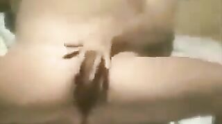 Girl caressed herself on the beach with a hidden camera