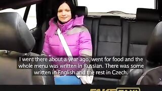 A hot girl is having fun with a taxi driver in his car
