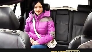 A hot girl is having fun with a taxi driver in his car