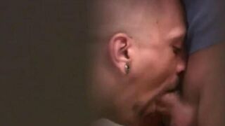 Two guys jerking each other off in a public toilet