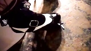 A cutie brunette masturbates her sweet pussy in the toilet, all alone